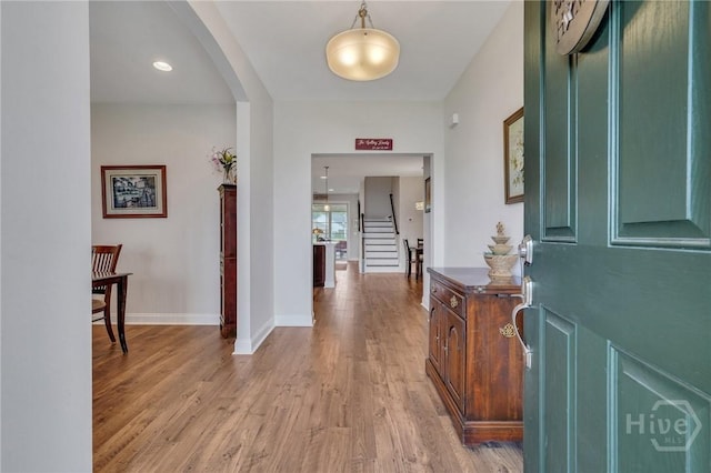 115 Merribee Ln, Pooler, GA 31322 - foyer with light wood-style floors, arched walkways, and stairs