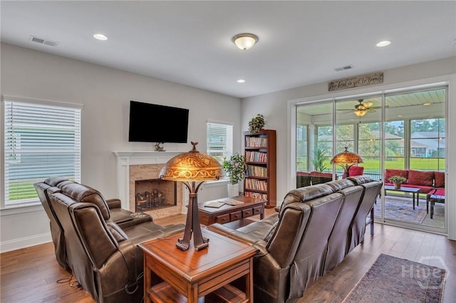 115 Merribee Ln, Pooler, GA 31322 - living area with wood finished floors, a fireplace, plenty of natural light, and recessed lighting