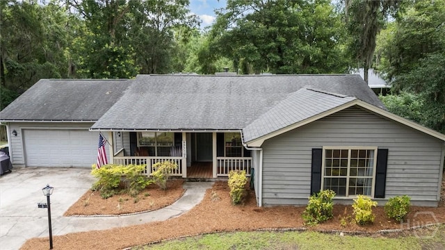3 Watford Rd, Savannah, GA 31419 - single story home featuring covered porch, a garage, driveway, a shingled roof, and view of scattered trees