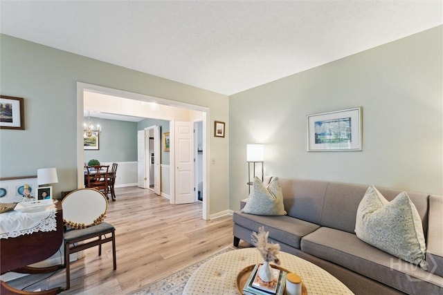 3 Watford Rd, Savannah, GA 31419 - living room with a chandelier and light wood-type flooring