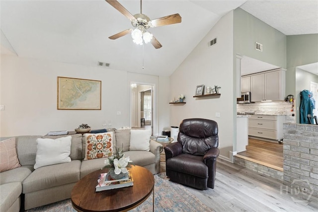 3 Watford Rd, Savannah, GA 31419 - living area featuring light wood-type flooring, a ceiling fan, and high vaulted ceiling
