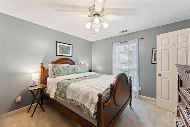 3 Watford Rd, Savannah, GA 31419 - bedroom with light colored carpet, a textured ceiling, and ceiling fan