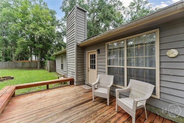 3 Watford Rd, Savannah, GA 31419 - deck featuring a fenced backyard and a fire pit