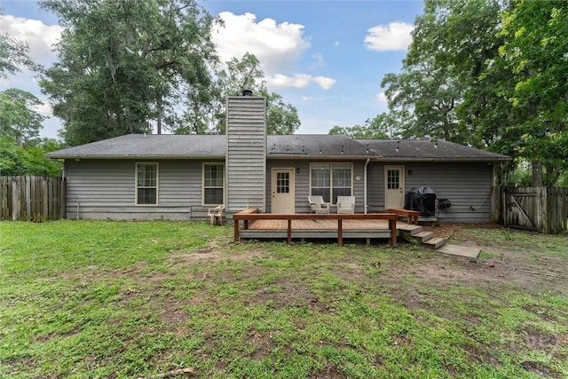 3 Watford Rd, Savannah, GA 31419 - back of property with a wooden deck, a fenced backyard, and a chimney