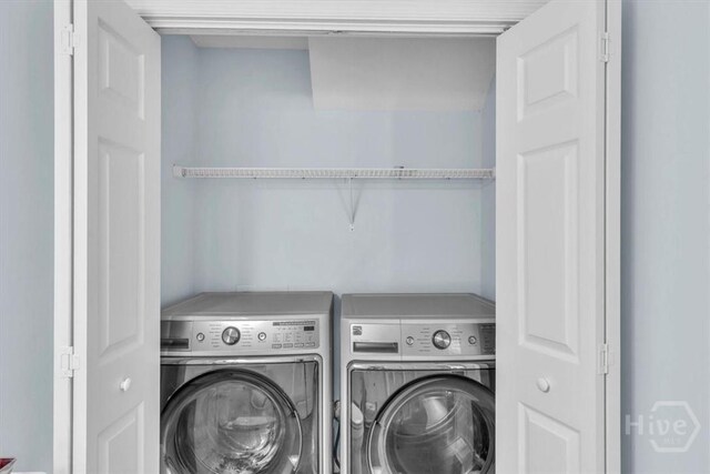 24 Marsh Hen Ct, Richmond Hill, GA 31324 - washroom with washing machine and clothes dryer