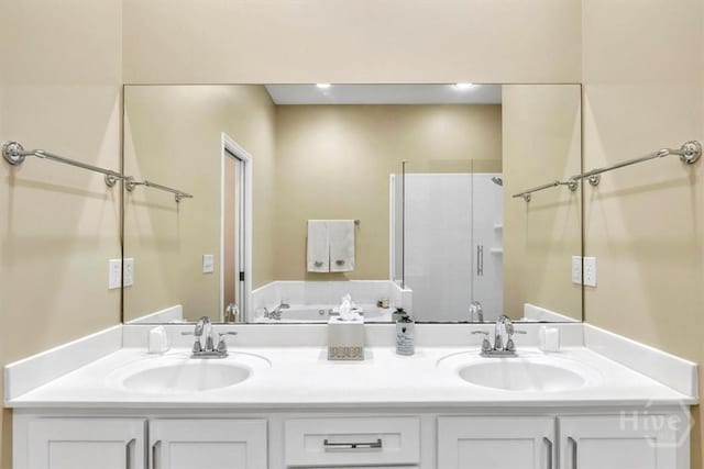 24 Marsh Hen Ct, Richmond Hill, GA 31324 - bathroom with double vanity, a garden tub, and a shower with shower door