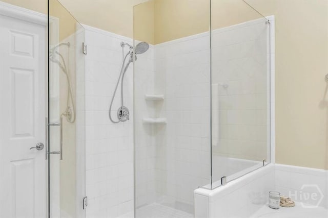 24 Marsh Hen Ct, Richmond Hill, GA 31324 - bathroom with a shower stall and a garden tub