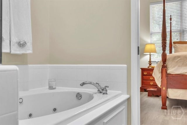24 Marsh Hen Ct, Richmond Hill, GA 31324 - ensuite bathroom with a tub with jets