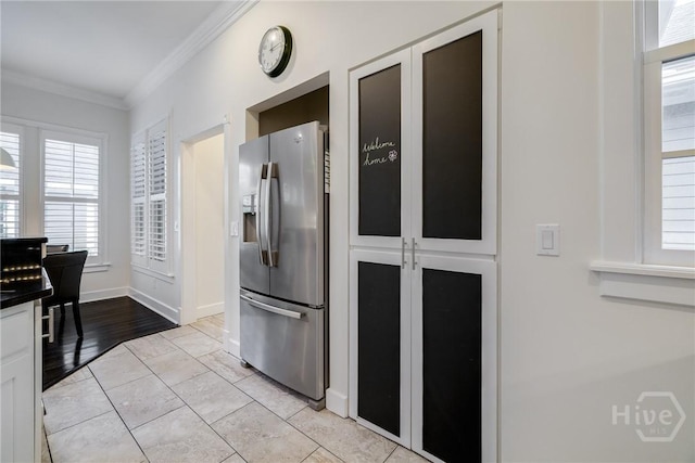 103 Daisy Ct, Savannah, GA 31404 - kitchen with stainless steel fridge, ornamental molding, and light tile patterned floors