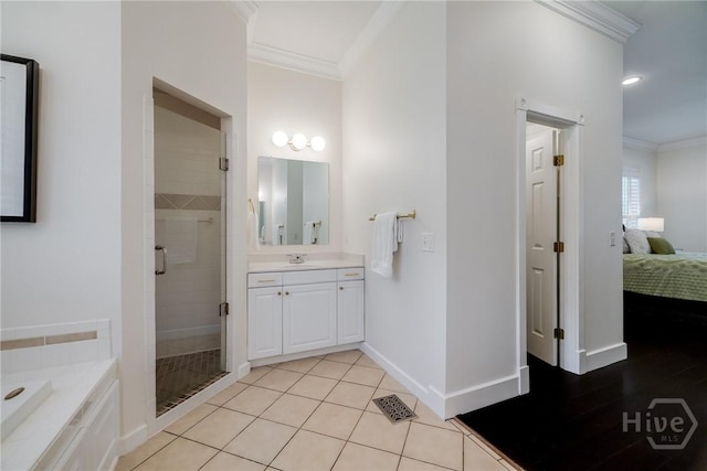 103 Daisy Ct, Savannah, GA 31404 - ensuite bathroom featuring ornamental molding, a shower stall, vanity, a garden tub, and tile patterned floors