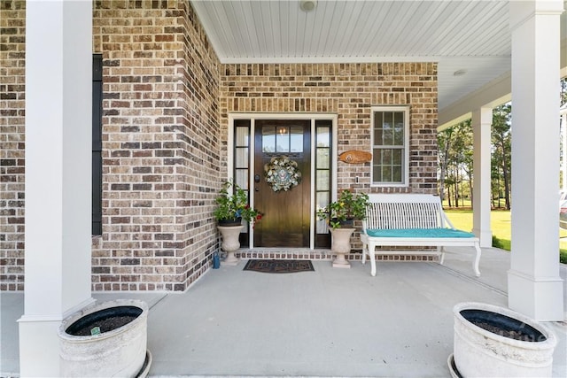 176 Trail Creek Ln, Savannah, GA 31405 - property entrance with a porch and brick siding