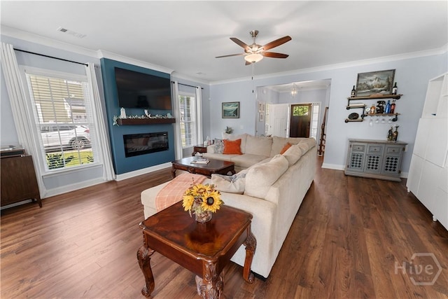 176 Trail Creek Ln, Savannah, GA 31405 - living room with a ceiling fan, ornamental molding, wood finished floors, and a glass covered fireplace