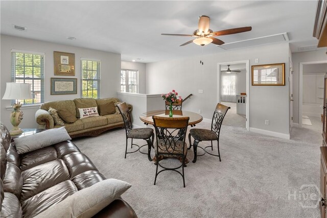 176 Trail Creek Ln, Savannah, GA 31405 - living room with attic access, a ceiling fan, light carpet, and healthy amount of natural light