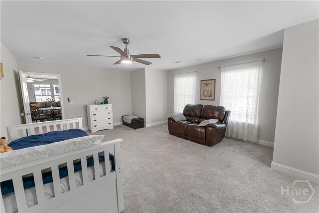 176 Trail Creek Ln, Savannah, GA 31405 - bedroom featuring multiple windows, carpet flooring, and a ceiling fan