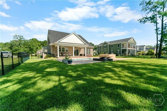 176 Trail Creek Ln, Savannah, GA 31405 - back of house featuring a patio area and brick siding