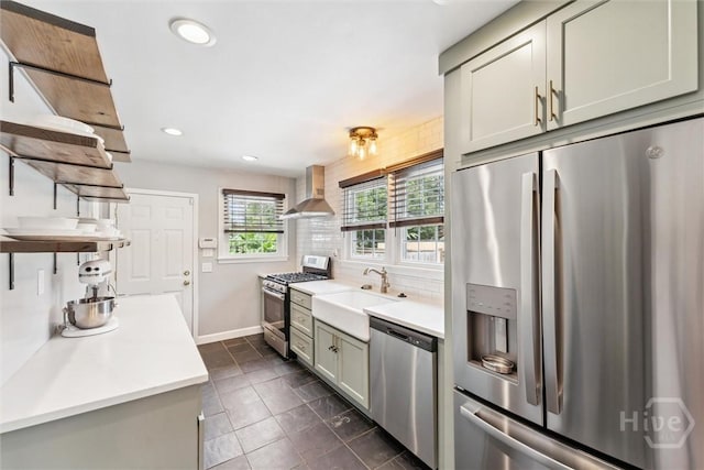 330 E 64th St, Savannah, GA 31405 - kitchen with appliances with stainless steel finishes, wall chimney exhaust hood, open shelves, light countertops, and recessed lighting