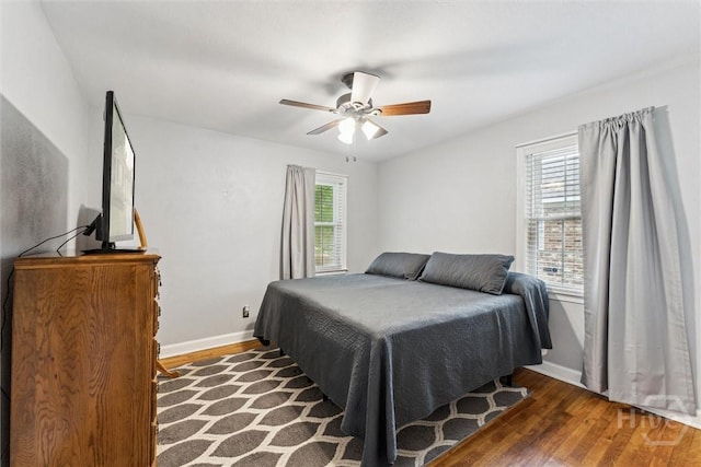 330 E 64th St, Savannah, GA 31405 - bedroom featuring wood finished floors and a ceiling fan