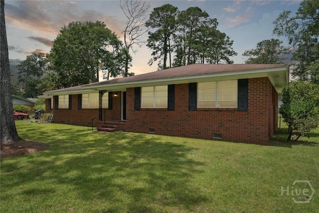 130 Hopecrest Ave, Savannah, GA 31406 - ranch-style house featuring crawl space, a yard, and brick siding
