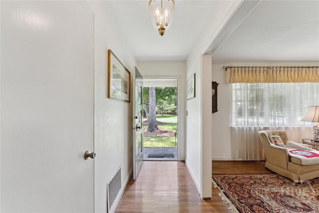 130 Hopecrest Ave, Savannah, GA 31406 - entryway with wood finished floors and a chandelier