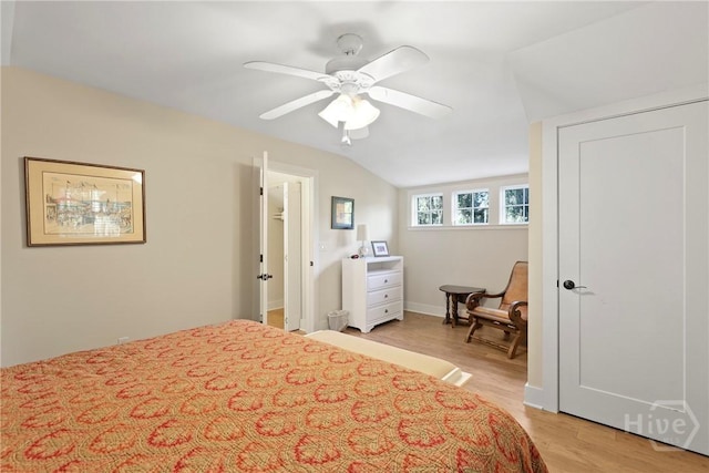 189 E 1st St, Midway, GA 31320 - bedroom featuring light wood-style floors, lofted ceiling, and a ceiling fan