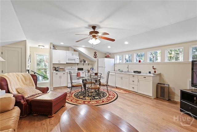 189 E 1st St, Midway, GA 31320 - living area with light wood-type flooring, a ceiling fan, and recessed lighting