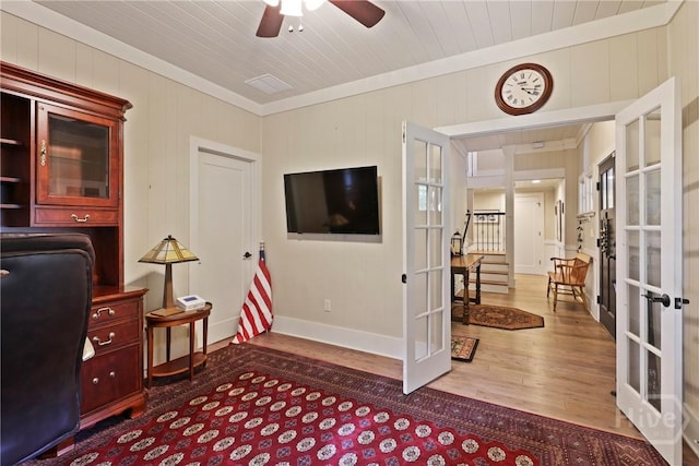 189 E 1st St, Midway, GA 31320 - office space with french doors, wood finished floors, ceiling fan, ornamental molding, and wooden walls
