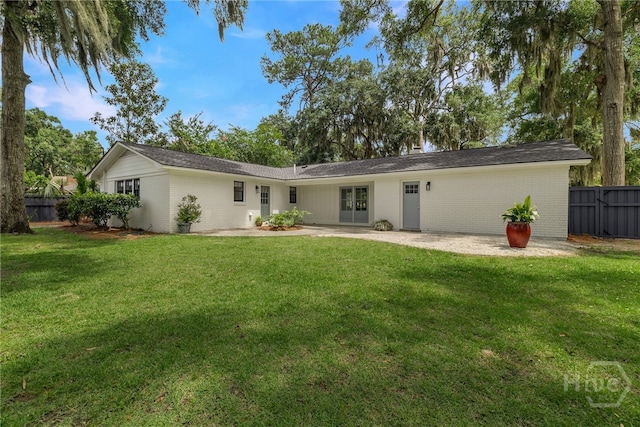 103 Kentshire Ct, Savannah, GA 31410 - back of property featuring brick siding, french doors, and a patio area