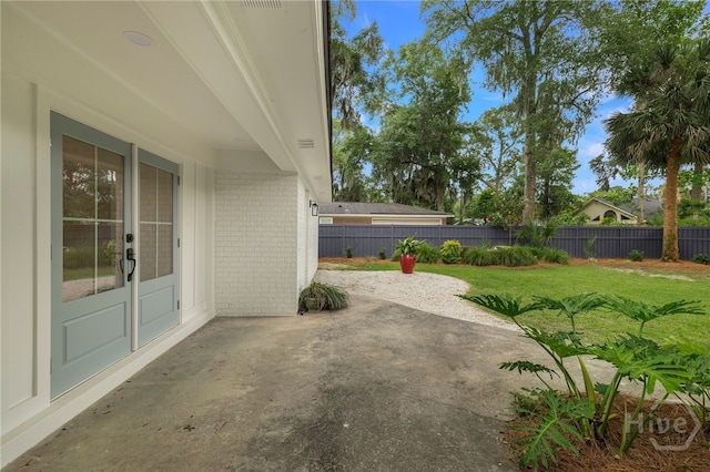 103 Kentshire Ct, Savannah, GA 31410 - fenced backyard with a patio area