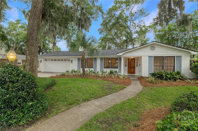 103 Kentshire Ct, Savannah, GA 31410 - single story home with an attached garage, a front yard, and brick siding