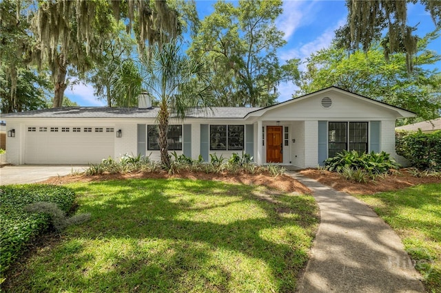 103 Kentshire Ct, Savannah, GA 31410 - ranch-style house with brick siding, a garage, a front lawn, and concrete driveway