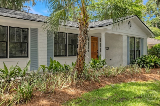 103 Kentshire Ct, Savannah, GA 31410 - view of front facade featuring brick siding and roof with shingles