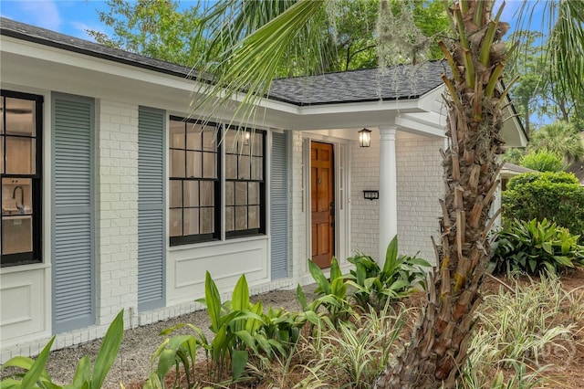 103 Kentshire Ct, Savannah, GA 31410 - property entrance featuring brick siding and roof with shingles