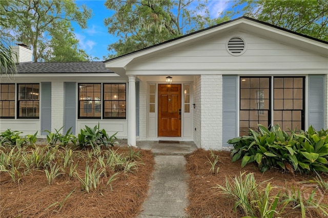 103 Kentshire Ct, Savannah, GA 31410 - view of front of house featuring brick siding and a chimney