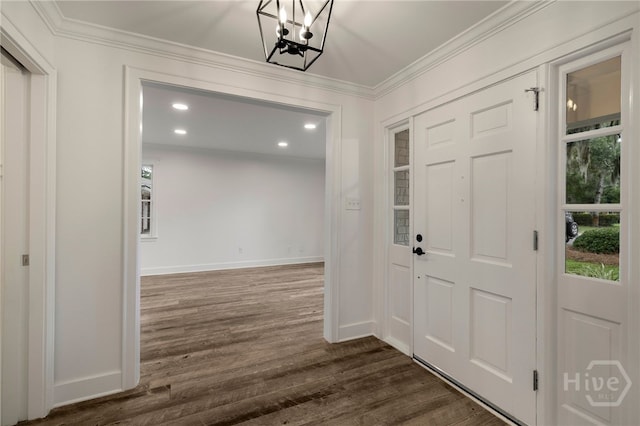 103 Kentshire Ct, Savannah, GA 31410 - foyer entrance with dark wood finished floors, ornamental molding, a chandelier, and recessed lighting