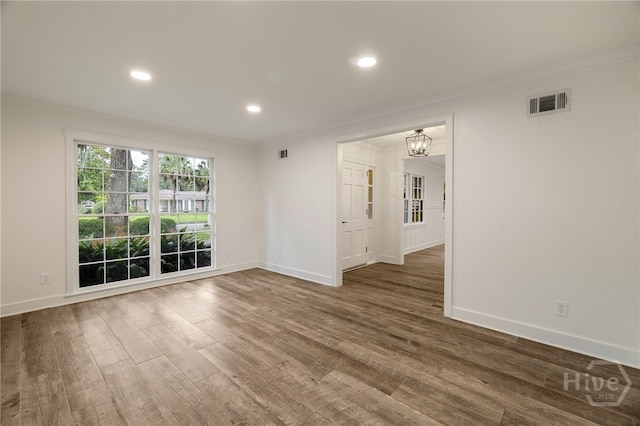 103 Kentshire Ct, Savannah, GA 31410 - unfurnished room featuring ornamental molding, wood finished floors, a chandelier, and recessed lighting