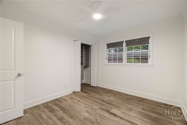 103 Kentshire Ct, Savannah, GA 31410 - unfurnished bedroom featuring wood finished floors, crown molding, a closet, and a ceiling fan