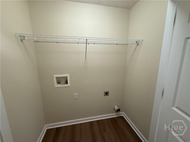150 Knotty Pine Cir, Springfield, GA 31329 - laundry area featuring electric dryer hookup, hookup for a washing machine, and dark wood-style floors