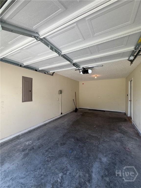 150 Knotty Pine Cir, Springfield, GA 31329 - garage with electric panel and a garage door opener