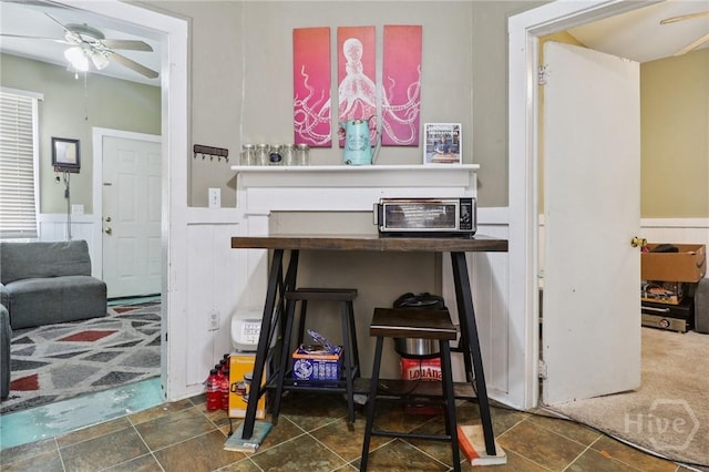 545 E Macon St, Savannah, GA 31401 - detailed view of a ceiling fan and a wainscoted wall