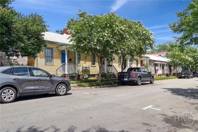 545 E Macon St, Savannah, GA 31401 - view of front of property featuring a metal roof