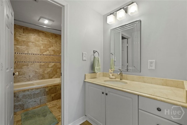 3113 River Dr Unit 10, Savannah, GA 31404 - bathroom with vanity and tiled shower / bath combo