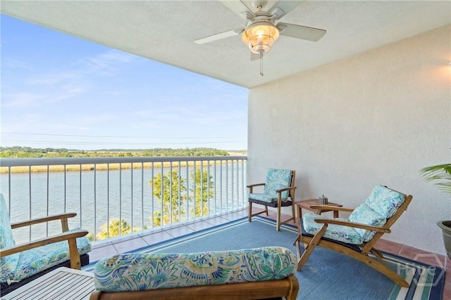 3113 River Dr Unit 10, Savannah, GA 31404 - balcony featuring ceiling fan and a water view