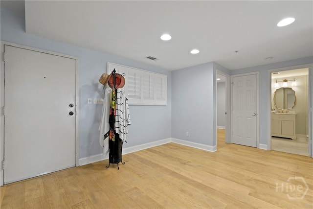 3113 River Dr Unit 10, Savannah, GA 31404 - foyer featuring light wood-style floors and recessed lighting