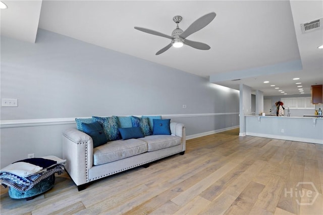 3113 River Dr Unit 10, Savannah, GA 31404 - living room with wood finished floors, ceiling fan, and recessed lighting