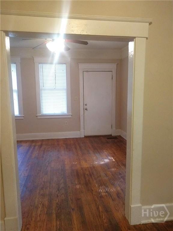 908-910 E 34th St, Savannah, GA 31401 - foyer entrance with wood finished floors, ceiling fan, and healthy amount of natural light