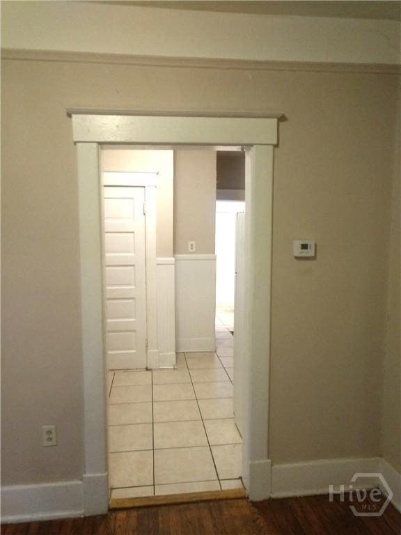 908-910 E 34th St, Savannah, GA 31401 - corridor with baseboards and light tile patterned floors