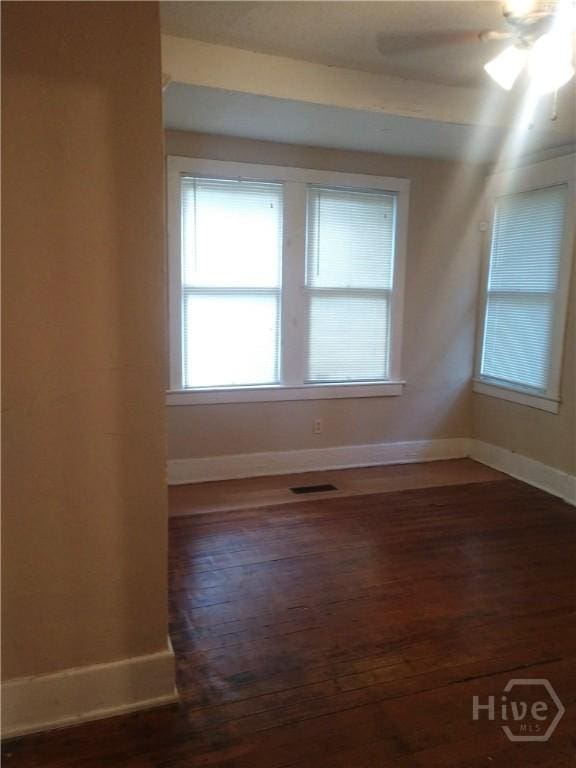 908-910 E 34th St, Savannah, GA 31401 - unfurnished room with dark wood-type flooring, plenty of natural light, and a ceiling fan