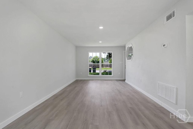 2204 Beaumont Dr, Savannah, GA 31406 - spare room featuring wood finished floors and recessed lighting
