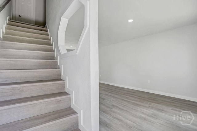 2204 Beaumont Dr, Savannah, GA 31406 - staircase featuring wood finished floors and recessed lighting
