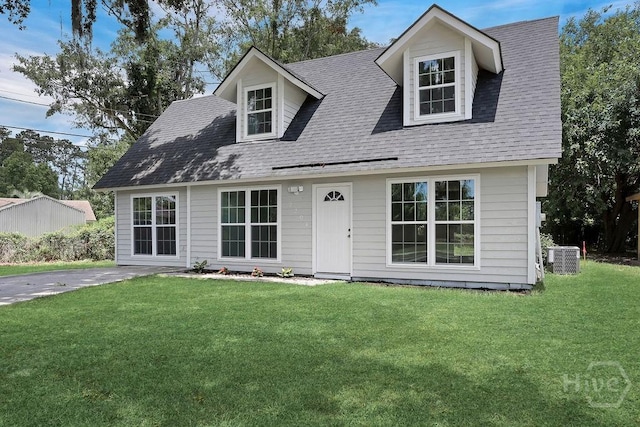 2204 Beaumont Dr, Savannah, GA 31406 - new england style home featuring a front lawn and a shingled roof